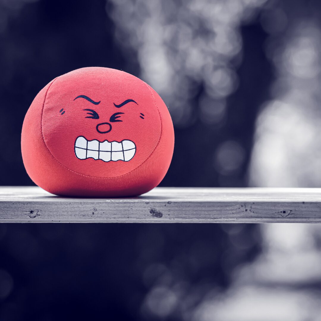 red angry ball depicting anxiety in autistic children