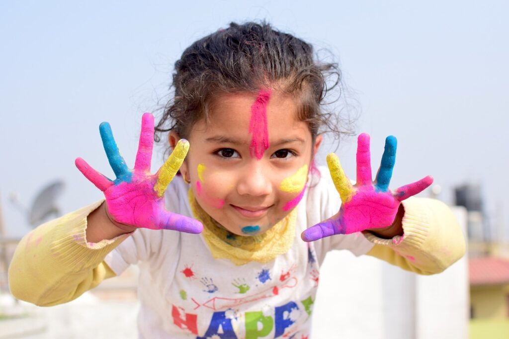 child art with painted colorful palms